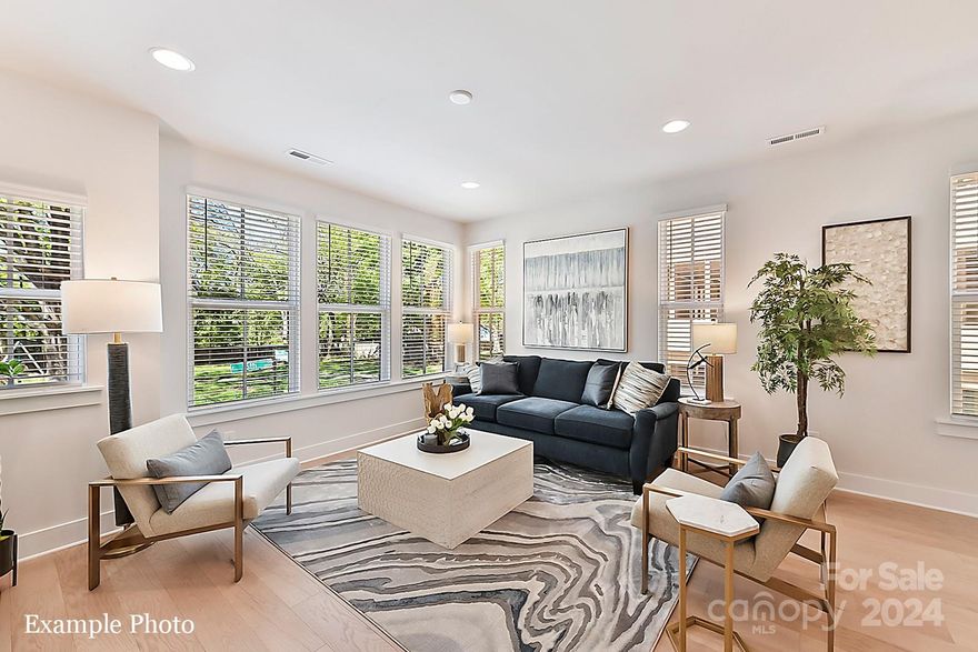 UNIQUE OFFERING: ROOFTOP TERRACE and SMALL BACKYARD! INCENTIVE of Up To $17,000 Towards Closing Costs or Lowering Your Interest Rate For A Limited Time! Located in the highly desirable Belmont Neighborhood at the edge of Plaza Midwood! Spectacular Location!  Craftsman Style Architecture on the Outside and Upgraded Premium Features on the Inside. You'll Love Coming Home and Parking in Your Own 2 Car Attached Garage w/ Garage Door Opener. Walk Upstairs and Enter the Open Concept Living w/ Dining Area, Kitchen and Great Room. Delight in the Upgraded Features such as: 5" Hardwood Floors, Oak Tread Staircases, Light Gray Craftsman Style Cabinets, Upgraded Quartz Countertops, Stainless Steel Appliances include Refrigerator, Range, Dishwasher, Microwave, Touchless Kitchen Faucet, Designer Lighting, Black Door Hardware, Blinds and more!