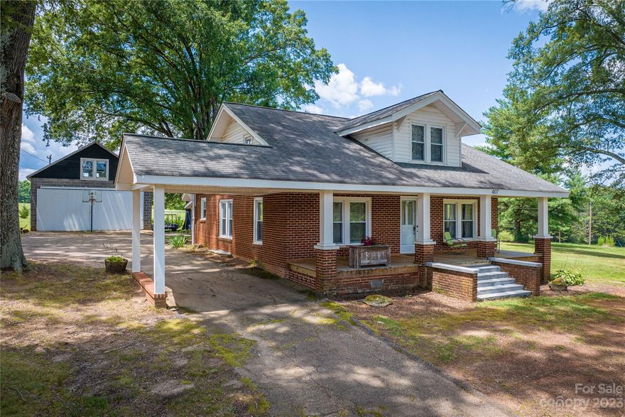 This home was built in 1952 and has not only a primary bedroom on the main level with direct access to a full bathroom, but three additional bedrooms upstairs with plenty of closet and storage space. Note: ceiling heights on the second floor are 6'9"

The property also boasts a large double garage with high ceilings and stairs leading to an open second floor with a window. The second floor could be used for many different things. Your imagination is the limit, storage, home office, etc. There is a very well-maintained outbuilding original to the property as well.

This home sits on 1.5 acres and still has beautiful interior details original to its construction. Conveniently located on the edge of the Taylorsville city limits and a short commute to any of the surrounding counties, this home is a true gem.