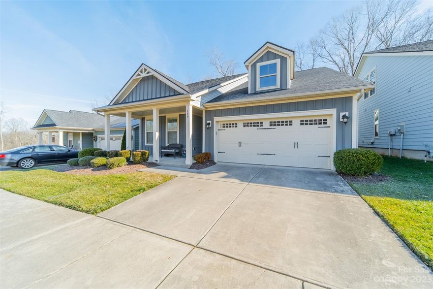 Enjoy this private 1.5-story patio home on a cul-de-sac lot with lawn maintenance included. The screened back porch overlooks a wooded area, and you can view the community pond from your covered, rocking-chair front porch! The primary suite is on the main level and has a walk-in shower. The great room features a gas log fireplace. The gourmet kitchen is upgraded with a 5-burner range, wall oven, and Frigidaire gallery appliances, and it has a walk-in pantry. The guest room has a full bath & there is an office/flex space on the main level. Also enjoy a sunroom, a walk-in shower in the upper-level bath, lots of closet space and plantation shutters throughout. Johnson Manor is a picturesque neighborhood offering walking trails, a clubhouse with gym, community garden, and a dog park. Served by award-winning MGSD schools, it is convenient to shopping and dining, and is just a short drive from downtown Mooresville, Davidson, Lake Norman, and I-77.