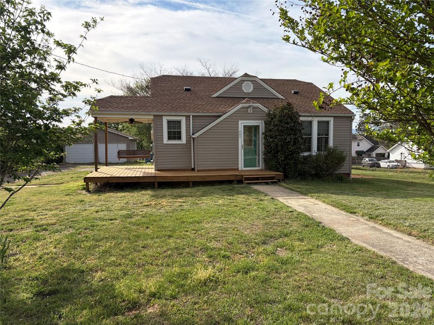 405 Jug Wilson St. is a wonderfully updated 4 bedroom 2 bath home in the town of Glen Alpine and is very conveniently located to I-40, schools, and medical facilities. The home features an updated  kitchen with modern cabinetry and appliances, refinished HARDWOOD floors and fresh paint in most rooms. Step outside and you will find a nice sized level lot with a detached two car garage with new doors and a 220 hook up for your electric vehicle or shop equipment. MOVE-IN ready.