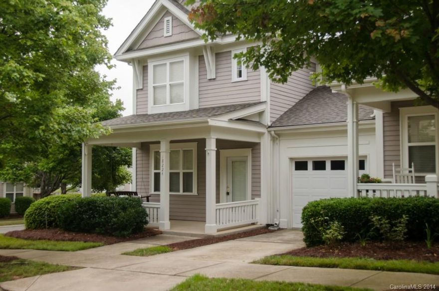 Beautiful end unit w/rocking chair front porch. 1st floor master w/walk-in closet. Fenced yard. One car gar attached. Fresh paint & clean carpet. Feels like you are on vacation every day. Enjoy the pool & walks on the boardwalk. Close to I77 & shopping. Xtra wide TV niche above fireplace. Open floor plan. Dual sinks in master bath.