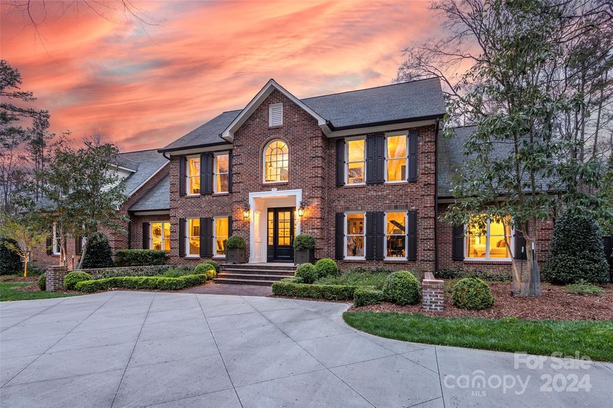 An exquisite home nestled on a gorgeously landscaped 1.22 acre lot with a saltwater pool! This crown jewel home  of Providence Plantation provides the perfect setting for entertaining & relaxing. A stunning circular drive welcomes guests & owners alike to this timeless estate which has been thoughtfully renovated with no detail overlooked. Updates & features include: a kitchen w/ inset cabinetry, a large island, & a Wolf gas cooktop & double wall ovens, refurbished fireplaces w/ marble surrounds & custom mantels in the family & dining rooms, hardwood floors, upgraded millwork, recessed & designer lighting throughout, remodeled bathrooms w/ high end finishes, a first floor guest suite/2nd primary, a custom laundry room/pantry/scullery-type room on the main plus a laundry room up, & a primary suite w/ 2 custom walk-in closets, stand-alone tub, & marble flooring. A screened porch overlooks the expansive travertine terrace, pool & patios. Come see all this incredible estate has to offer!