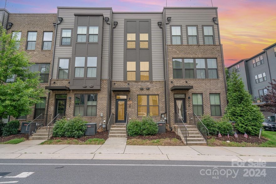 Experience luxury living in this South End townhome! Spacious 2-car tandem garage. The gourmet kitchen with island, eat up bar, stainless appliances, gas cooking, and counter depth fridge awaits at the top of the stairs. The main level is perfect for entertaining, with adjoining dining area, 1/2 bath and balcony. The great room floods with sunlight from all the windows. On the 3rd floor, find the 1st of 2 bedrooms, guest and primary. Ensuite with double sinks and a walk-in closet. Laundry closet is on this floor. The 2nd bedroom features an ensuite bathroom and walk in closet also. The top floor unveils another bedroom with and walk-in closet, along with a rooftop terrace for enjoying each season ourdoors.