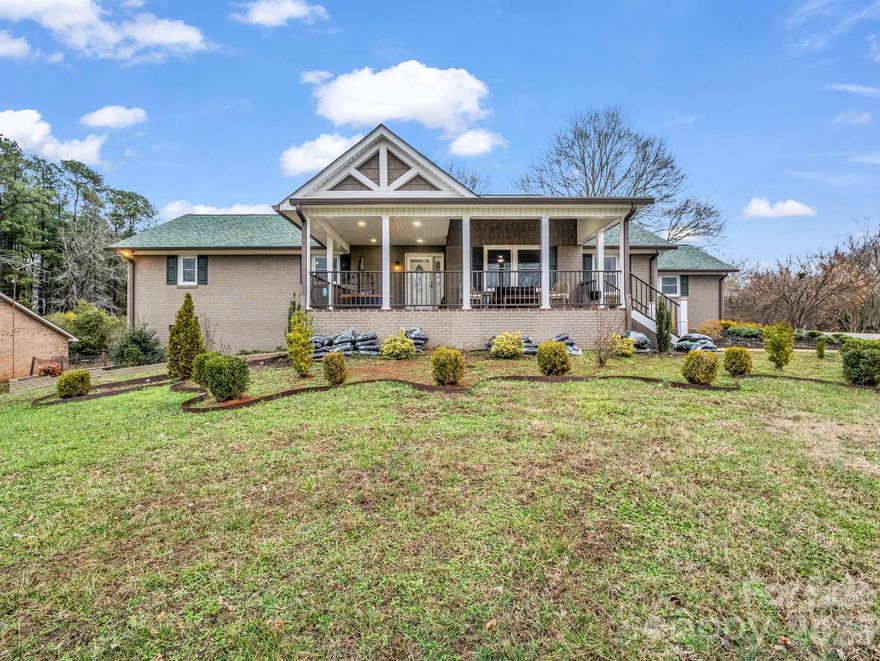 MOTIVATED SELLER! Welcome to this beautifully updated, move-in ready home offering 3 spacious bedrooms and 2 large bathrooms. Designed with an open floor plan, the kitchen flows seamlessly into the living and dining areas—perfect for everyday living and entertaining. A versatile flex space provides endless possibilities for a home office, playroom, or additional sitting area. Enjoy the comfort of generously sized bathrooms and modern upgrades throughout, including new windows, new appliances, and a tankless hot water heater for energy efficiency and convenience. Relax year-round on the expansive enclosed back porch, fully heated and cooled for all-season enjoyment, or unwind on the charming large front porch. This home combines comfort, style, and functionality—truly a beautiful place to call home.