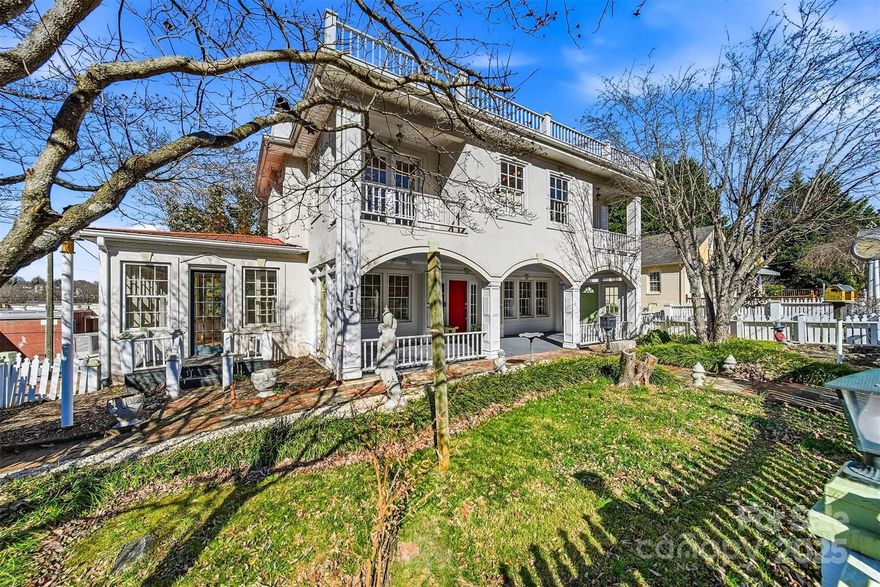 Step into timeless elegance with this stately 1945 NEOCLASSICAL-STYLE residence set in the heart of DOWNTOWN LENOIR. Offering 6 bedrooms and 4 bathrooms, this GRAND HOME blends historic character with flexibility. Built to entertain!  Numerous fireplaces throughout the property add warmth, charm and historic character!  Enjoy gatherings of all sizes on the home's massive covered front porch, a true extension of the living space.  Offering room for dining, lounging, and hosting guests in every season. The home welcomes you with a grand entrance with a graceful transition into the main living areas.  The main level offers a study, dining room, large living room, sunroom, main level primary bedroom with a 2nd bedroom or private dressing room and a main level laundry room.  The beautiful kitchen features a spacious island, butler's pantry, tiled backsplash, apron front sink, large walk-in pantry & an inviting breakfast room.  The upper level offers 4 additional bedrooms, 2 with sitting areas/dressing rooms, private ensuite bathrooms and balconies as well as a centrally located bathroom with a 2nd laundry center.  The basement provides storage or space for a workshop. The zoning will allow office or professional use, ideal for those who want to live and work under one roof. A rare opportunity to own a landmark-style property with endless potential.  Located in the Foothills of the NC Mountains within walking distance to shopping, restaurants and more!  A true classic beauty with enduring charm and elegance!  An easy drive to Blowing Rock or Hickory!!!  A little over an hour's drive to Charlotte Douglas Airport!