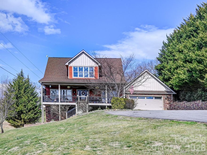 Beautiful well maintained Arts & Crafts style home on a large landscaped lot.  3 bedrooms, 2 full baths, large spacious living room that is open to the kitchen and dining area.  The living room features a large rock fireplace with gas logs.  Kitchen features stainless steel appliances, granite countertops, an abundance of storage and prep space.  Hardwood and tile throughout the main level of the home.  Upstairs you will find a large primary suite and bathroom with custom tile shower with glass door enclosure and large garden tub.  There is also an oversized walk in closet and sitting area that is located just off of the primary bathroom.  Enjoy the large covered porches, front and back.  The back yard is fully fenced which is a nice feature for family and pets.  Downstairs in the finished basement you will find a large family room as well as an office/fitness area with closet.  Conveniently located 8 minutes from Weaverville.