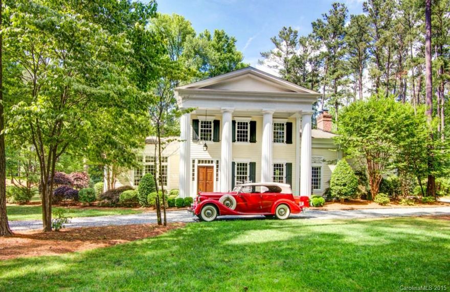 History meets the 21st century when you enter! Newly built, 1840s-style Greek Revival home sits on 2 acres of prime lakefront.Built in 2007, it offers modernity with the charm and ambiance of a historical home.Period architecture is faithfully recreated with interior finishes: heavy wood molding, wood burning hearth in kitchen, broad plank flooring, exposed beam ceiling, also large screened porch, and perfect swim beach.A must-see in Lake Wylie! Adjacent 1-acre lot w/dock is also available.