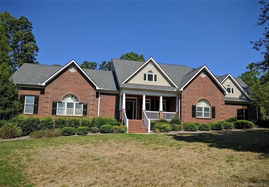 Welcome home to this spacious, solid brick home resting on a 2.5 acre lot in one of Rock Hill's finest neighborhoods! From the sparkling wood floors in the open great room to the screened in porch overlooking the private backyard, this home was built to amaze. Relax in the master suite on the main after a long day working in the study with custom wood cabinetry! Take your projects outdoors in the workshop with it's own half bath! Hidden out back you will also find an additional workshop!