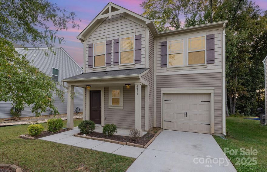 Tucked away in a beautiful, established community, this charming home offers comfort, convenience, and connection—all just minutes from Uptown Charlotte. Ideally located near both I-77 and I-85, you’ll enjoy easy access to shopping, dining, and entertainment while still feeling a sense of peaceful retreat. Step inside to an inviting open floor plan where the living room, dining area, and kitchen flow seamlessly together—perfect for entertaining or everyday living. The kitchen features stainless steel appliances and ample counter space, with a convenient powder room on the main level. Upstairs, you’ll find the spacious primary suite with a private ensuite bath and dual sinks, two additional bedrooms, a full bath, and a laundry room. Outside, enjoy a large, flat fenced backyard—ideal for relaxing, gardening, or play.