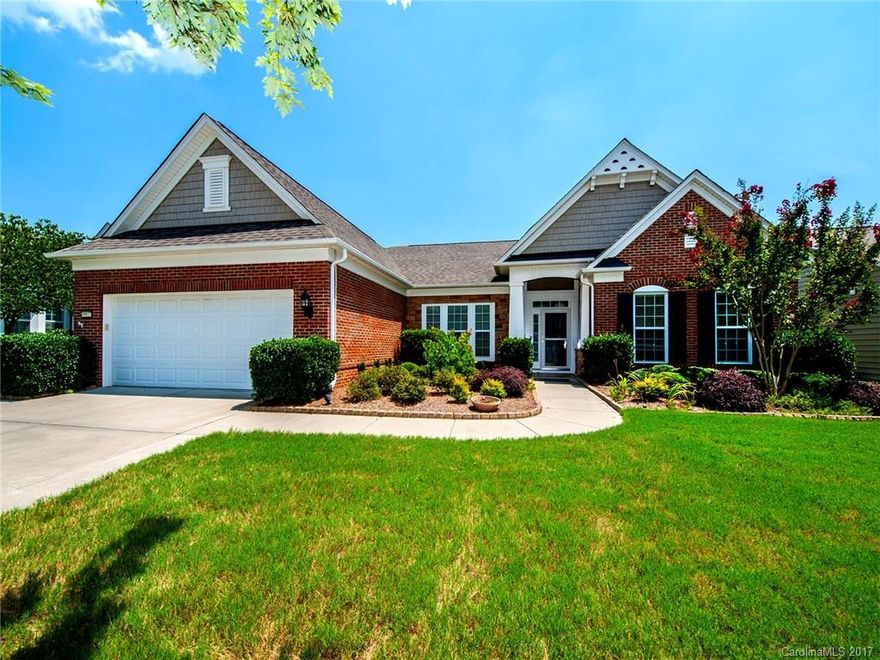 Move right into this popular Chestnut Garden with sunroom. Open floorplan. formal dining room, den with glass doors. Kitchen w/Cherry cabinets, granite, center island, ss appliances.  Breakfast nook. Pull out cabinet shelves in kitchen & master bath. Great room with corner gas fireplace. Large master with coffee bar & built-in cabinets. Solar skylight in kitchen and hall bath. Lots of windows for natural light.  Covered patio and Pergola. Natural gas hook-up for grill. New paint throughout.