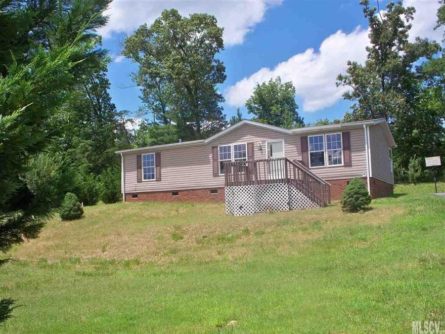 3 bedroom 2 bath manufactured home in the country.  Make this one your family home.  Front porch and rear deck.  Paved drive.  Large master bedroom has on suite with garden tub.  Open floor plan.  Split bedroom plan.  Close proximity to Highway 321N.  Near schools and shopping.  This is a Fannie Mae HomePath property.