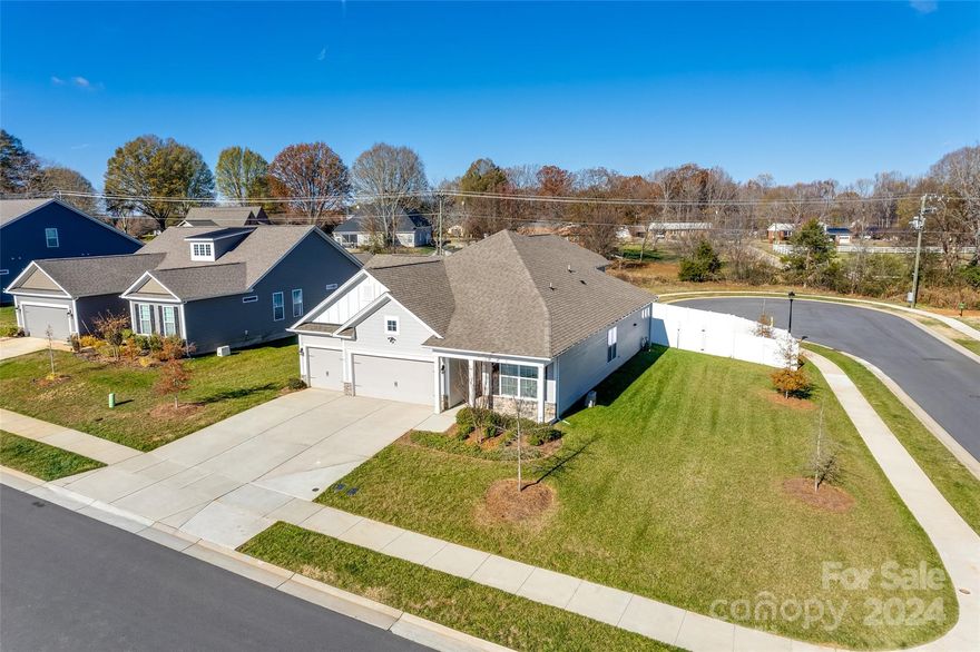 The open floor plan seamlessly connects living, dining, & kitchen areas, highlighted by a recent stone fireplace addition. The kitchen boasts high-end appliances and granite countertops. With a paver patio with a fire pit in the fenced backyard, offering a privacy. The home office caters to flexible living arrangements, and the primary suite provides a tranquil escape with a luxurious ensuite bathroom.The Meadows at Coddle Creek stands as a recently established community situated south of Mooresville on Hwy. 3. Residents can indulge in the community's amenities, including a pool, cabana, and bocce ball court for their entertainment.With the added benefits of HOA-managed lawn maintenance, this home offers a lifestyle of ease and enjoyment. Don't miss the opportunity to make this property your own and start creating a lifetime of memories. Schedule your showing today!