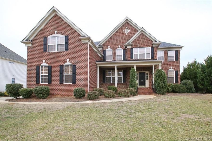 Remarkable brick home! Open floor plan. Formal dining and living areas with crown molding! Great room features cozy fireplace. Kitchen has granite counters, huge pantry and solid oak cabinets! Main level has guest suite.