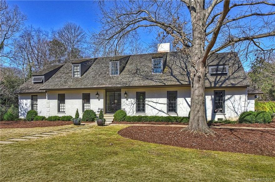 Rare opportunity for a truly unique home in beautiful & highly sought after Foxcroft.  Situated on a quiet, corner lot, this Ruard Veltman designed home offers a state-of-the-art kitchen, metal/industrial doors inside & out, & hidden office. Screened back porch w/fireplace overlooks a private backyard w/an outdoor kitchen & fire pit. Master suite & guest suite located on 1st floor. 3 BR up & two bonus areas offers extremely spacious 2nd floor living. Beautiful antique reclaimed heart pine floors