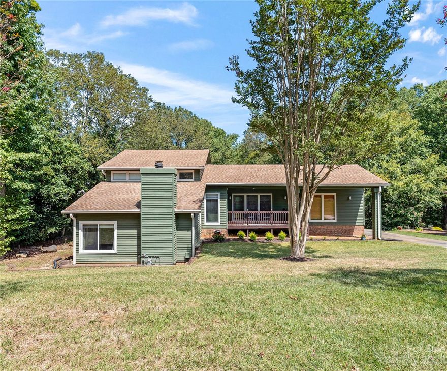 Wow! Welcome home to 8613 Lorraine Drive.  This home is located in a quiet neighborhood in a super convenient location, central to Uptown, Southpark, and Matthews. As you arrive, take note of the amazing lot-one of the best in the neighborhood.  As you step in side, you will notice how natural light floods the space through the abundance of windows.  This home likes to show off from its beautiful floors to it’s vaulted ceilings.  The open living space has endless possibilities that naturally flows to the kitchen and dining room. Make sure you don’t miss the built-in cabinetry and extra touches throughout the home including the wonderful bar area under the steps, the great storage in the kitchen, and 2 in the hallways!  Notice the nice sized bedrooms and bathrooms. Step outside to a large fenced-in backyard that is perfect for playing and entertaining-it even includes a custom built playhouse!   Also a 2 car garage!  
This one feels like home.