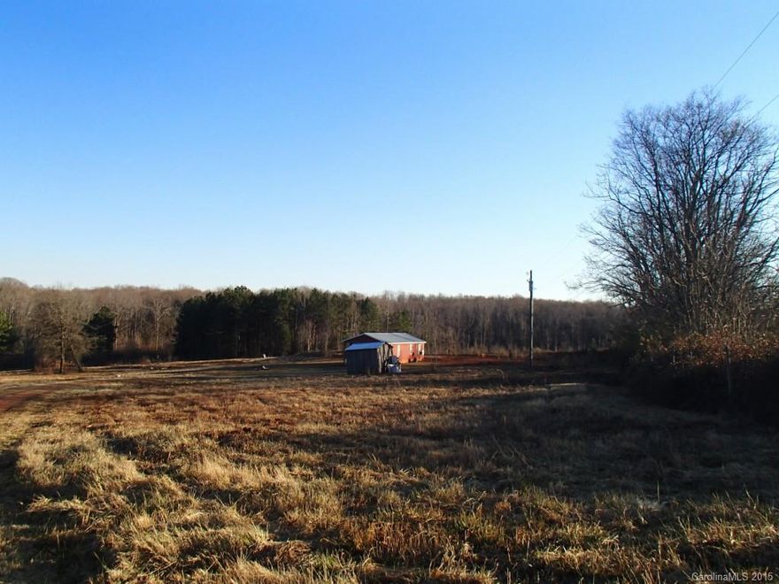 Secluded 41 acre oasis tract of wooded land perfect for a farm or a private estate. Existing home on site was rebuilt in 2007, tenant-occupied can be used for private in-law suite or investment property! Deeded no manufactured or modular housing. Will subdivide. 24 hour showing notice required.