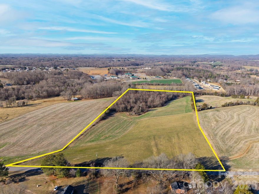 First time offered on the market — a beautiful 20-acre tract in desirable Yadkin County, ideally located off Dobbins Mill Road. This property features excellent road frontage and a landscape that is mostly cleared with a balance of mature, wooded areas that add privacy and natural character. A small stream winds through the acreage, and a peaceful pond sits toward the back of the property, enhancing the serene setting. With its generous size and versatile topography, this land presents an exceptional opportunity for development, a private estate, mini-farm, or recreational retreat. A rare chance to secure usable, scenic acreage in a convenient location.