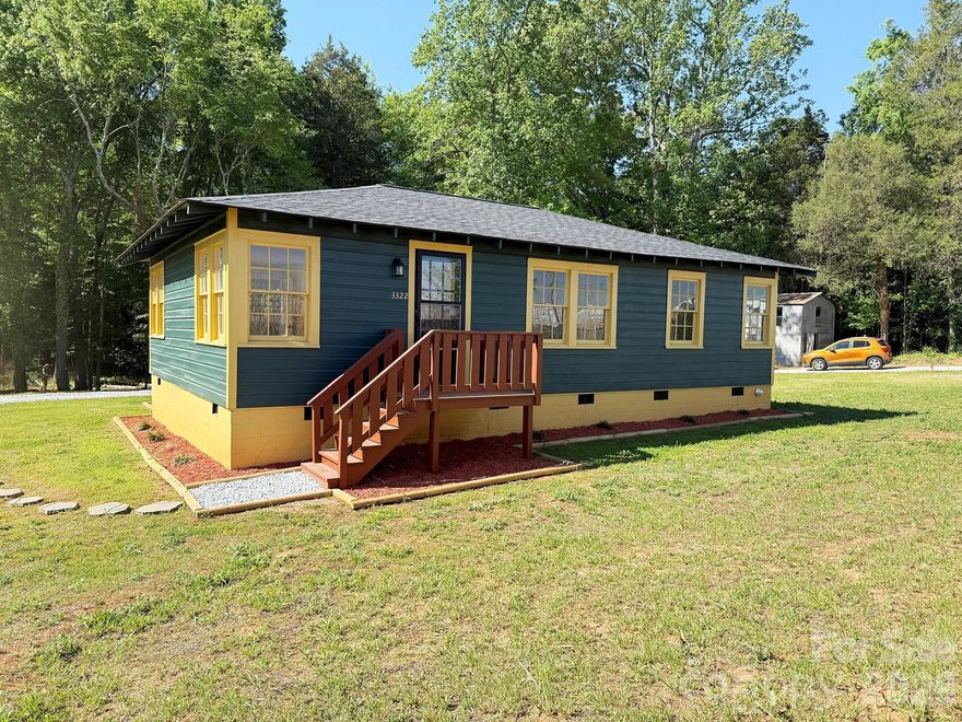 Rare Find--Updated home on two lots--1.96 acres total.  Solid well built house.  The 0.96 acre parcel with house is fenced with a two story workshop.  The extra 1.00 acre lot has been surveyed and adjoins the back of house lot.  New roof, HVAC, water heater, plumbing and electrical.  Wood floors with no carpet any where in the house. Brand new gravel on driveway and access road to 2nd lot.  Iredell County location convenient to Statesville, Mooresville, Salisbury, Concord, and Charlotte.  When coming with a real estate agent, park outside the main gate and enter through the adjacent small gate.