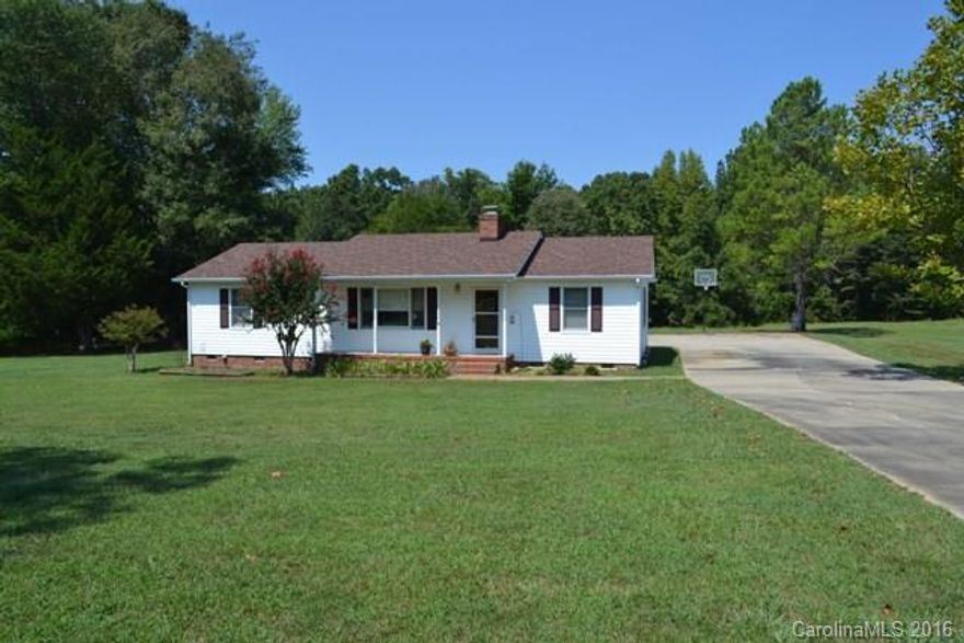 Great ranch home sits on 4.5 beautiful acres.  Only one owner and it is immaculate.  Open floor plan with spacious kitchen that has solid surface counter tops, gas cook top, refrigerator, new dishwasher.  Huge sun room has cedar walls!  There is also a detached garage with tons of storage for equipment, plus an office and half bath.  Office is heated and cooled.
