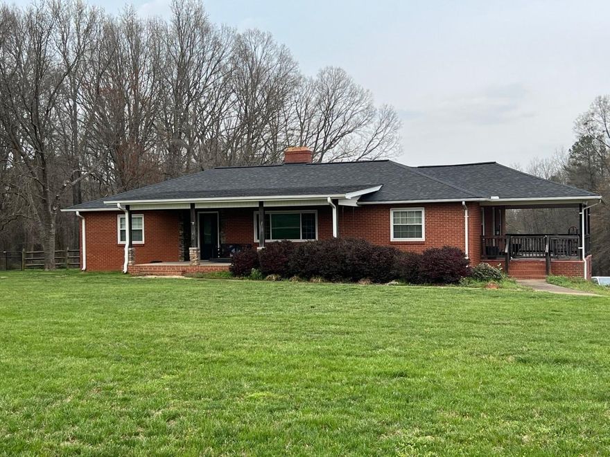 Wow, check out this spacious all brick ranch home on large lot (approx. 1.75 acres) with a fenced in backyard! Country living but only minutes from downtown Mooresville. Nicely updated home has three nice sized bedrooms. Primary bedroom not only is large but has a very nicely updated bathroom and huge walk-in closet. You will find lovely hardwood floors throughout the entire home with the exception of the two bathrooms which are tiled. Not only is there a front covered porch but also a side covered porch and back covered porch. Plenty of parking! No HOA! Freezer in basement if remains is as/is.
Mandatory Resident Benefits Package is an additional $25/mo. and offers many great benefits (air filter delivery service, 24/7 maintenance, maintenance reimbursement for unintended charges/lock outs, credit building, rewards program, utility connection concierge, and more!)