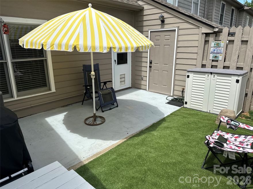 The only available townhome in this desirable community won't last at this affordable price with so many upgrades in such a convenient location. Beautifully remodeled spacious home with brand new kitchen and baths plus  gleaming wood laminate floors. Main level ensuite bedroom plus upper level ensuite bedroom. Keyless entry on front, back and storage doors, Ecobee smart thermostat, 2 designated parking spaces plus guest parking, lovely fenced, private rear backyard area perfect for entertaining and relaxing with natural gas line hook up line for grilling. Huge outdoor storage closet. Large upper level laundry area with storage. Perfect location close to all conveniences only 10 minutes to downtown Asheville and Black Mountain with community park recreation area with in-ground pool and lovely babbling creek green space area to enjoy serene walks. Such an excellent value in the mountains waiting to welcome you home.