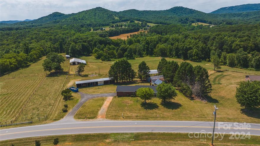This +/-17.98 Farm has been active for decades raising cattle and growing a homestead garden!  Golden opportunity to move right into a farm that was 70 years in the making.  Lovingly built around 1954 this Carolina All Brick ranch has 3 bedrooms and 1.5 baths (a 4th room was used as a bedroom) and approximately 1400sq ft of living space not counting the enormous carport that can hold the tallest of vehicles and a cozy breezeway/mudroom as you enter the home.  Complimented by a 1400sq ft basement which holds solar treasures.  The home has a brand new roof, updated electric, newer hot water heater, HVAC and solar panels to assist in hot water heating along with a Carolina Water wood stove that is capable of heating the entire home.  

Approximately 15 acres fenced to include wooded and grassy pastures.  Your animals will love the +/-500ft of frontage along grassy creek!  Take the edge of summer heat with an old fashioned dip in the creek!