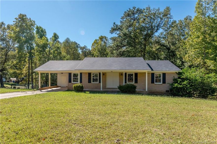 This house is a gem - if you are looking for a home in the Buford community with no worries look no further! Brand new windows, roof, fresh paint, and new carpet.  Gas pac is only 3 years old.  New deck overlooking private fenced yard.  Qualifies for 100% financing.  Call now!