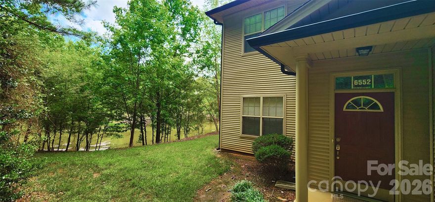 Rare opportunity in sought-after Michaels Landing! This 3-bedroom, 2-bath corner-unit condominium offers the perfect blend of comfort, potential, and location. Featuring durable LVP flooring throughout, a single-car garage, and a functional layout, this home is priced to give you the chance to add your own personal style and updates. Enjoy peaceful pond views right from the kitchen window, creating a relaxing backdrop for everyday living. The spacious primary suite includes a private en-suite bathroom for added comfort and convenience. Conveniently located close to the university area, shopping, dining, and Uptown Charlotte, this home combines everyday convenience with incredible value. With its desirable corner location and great bones, this condo is full of potential and ready to become your perfect home!  MORE PICTURES TO COME SHORTLY!