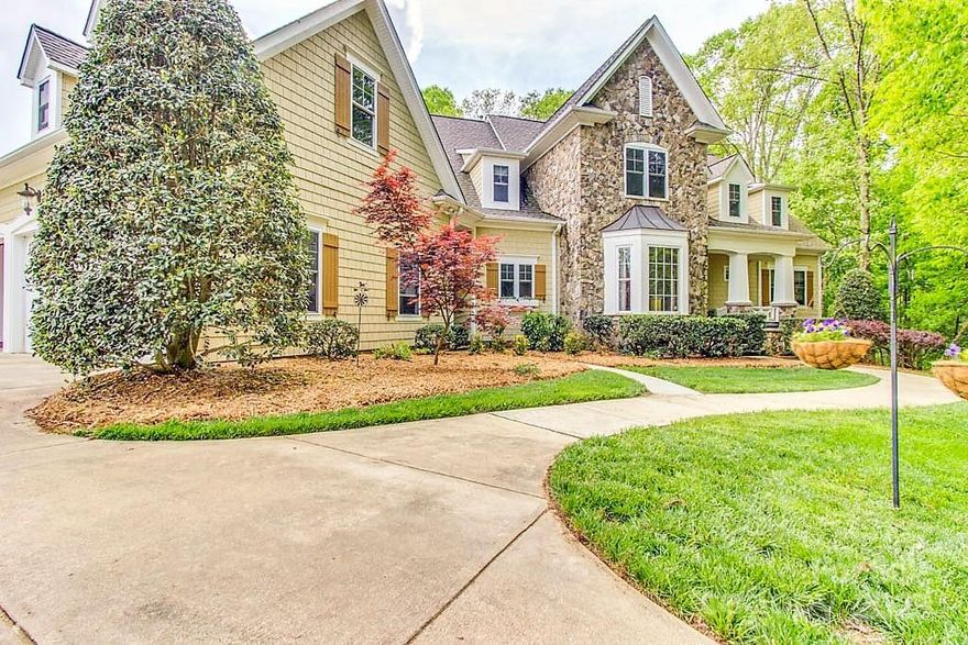 Great news for those of you that missed out the first time, back on the market, sadly the buyer wasn't able to get  their home under contract. Enjoy privacy, beauty, and refined country living on this gated 30+ acre equestrian estate with fenced pastures, crop fields, wooded trails, and a creek. The 4,958 sq ft custom home offers hardwood, slate, and tile floors, 10' ceilings, arched doorways, extensive trim, surround sound, and stone accents. The chefs kitchen features granite counters, a 3" butcher block island, tile backsplash, Blue Star 6-burner cooktop, double ovens, warming drawer, butlers pantry with wine cooler/ice maker, and a private kitchen office. Relax in the sunroom, or gather by fireplaces in the keeping room or den. The main-level primary suite includes a sauna, whirlpool tub, sitting room, and dual walk-in closets. Upstairs offers two guest suites, two baths, and a spacious office/library with cherry cabinetry, built-in desks, and hardwood floors. Two 3-stall barns, paddocks, auto waterers, climate-controlled workshop, and 4-bay parking - just 35 minutes to Charlotte.