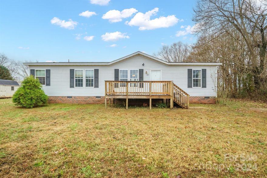 Experience the charm of rural living on a spacious one-acre lot, conveniently located to the city of Cleveland and easy access to Statesville and Salisbury for shopping, dining and more. This home features a split-bedroom concept and open floor plan with plenty of room to make this space your own.