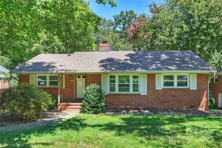Charming brick ranch in sought-after Colonial Village on an incredible .42-acre lot—260 feet deep! This home offers endless potential: move right in, expand, or build new on one of the neighborhood’s largest lots. Inside, enjoy beautiful wood floors throughout (except bath), a fully renovated kitchen (2018), updated bath (2014), and cozy living room with gas logs. Major updates include HVAC (2023), roof (2016 or 2017), and windows. The expansive sunroom (not included in the heated living area) adds 300+ sq ft of bonus living space, and both the front and backyards feature irrigation. Whether you're looking for your next home or a prime investment opportunity, this property delivers. Minutes from South End, Dilworth, Uptown, Park Road Shopping Center, SouthPark, and the Airport—location doesn’t get better than this!  Fireplace is sold in 'as-is' condition with no problems known.  Deck is sold in 'as-is' condition and is in need of work.  Dates given above for systems and renovations are to the best of the seller's knowledge.