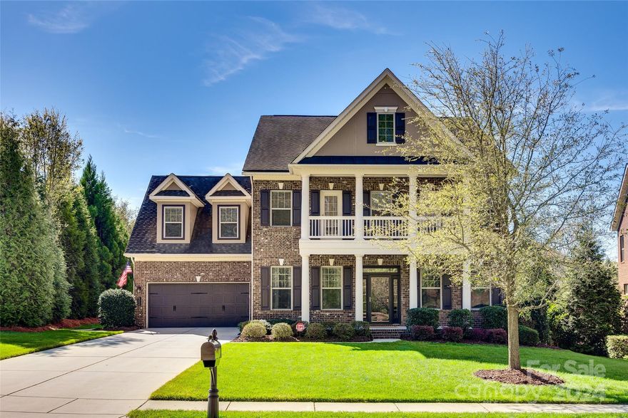 Stunning full brick home in sought after Barber Rock neighborhood! Luxury touches throughout with detailed trimwork and gorgeous coffered ceilings in the living room. The gourmet kitchen is equipped with upgraded appliances like a Bosch dishwasher, an expansive island, and roll-out drawers for added convenience. Enjoy purified water with a full house filtration system and control your home's temperature with Nest thermostats on both levels. Outdoor living is a delight with a covered front porch, upstairs balcony, screened back porch, and stamped concrete patio with a Sunsetter awning. Upgraded landscaping, leaf-filtered gutters, and a full yard irrigation system makes maintenance is a breeze. Barber Rock is centrally located in Indian Land between Ballantyne and Fort Mill and includes access to community amenities like an outdoor pool, playground and more. Don't miss out on your chance to call this meticulously crafted home yours!