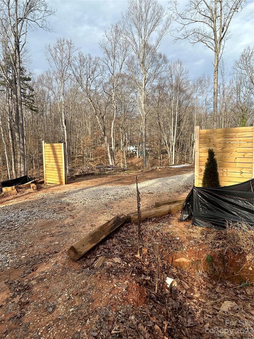 Secluded and private lot with Water View. Convenient to I-485. Established neighborhood with great potential for a new home close to amenities like a Golf Course and Sports Complex. Lot is ready to be built. Septic permit, Well permit, survey are available from previous owner. Current owner has cleared the lot but has decided not to build.