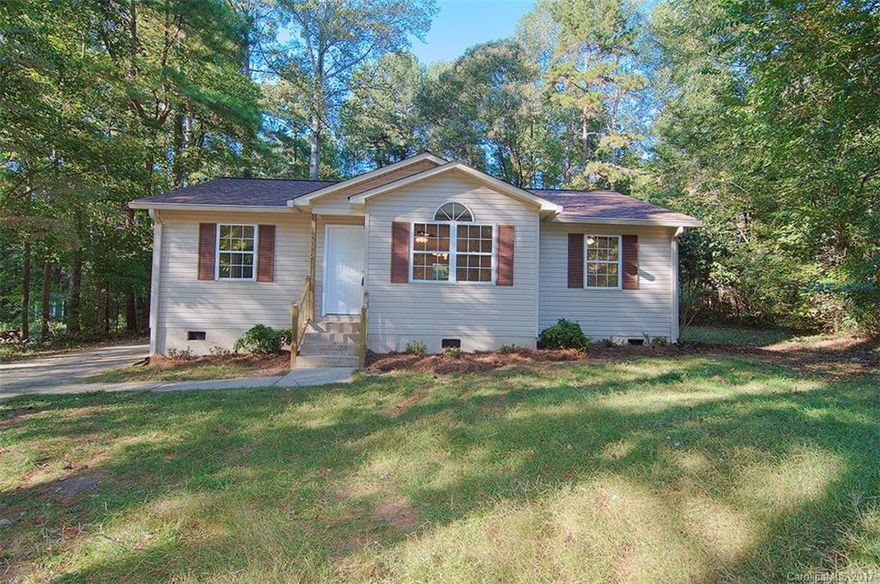 Newly remodeled 3 bedroom 2 bath one story home. New wood laminate flooring, new carpet, granite counter tops, tile back splash, stainless steel appliances, new lights and fans and brand new HVAC.