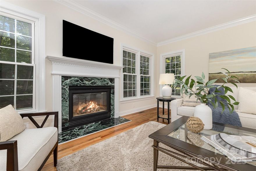 Prepare to be wowed by this stunning full-brick, 4-bedroom home in the sought-after waterfront community of Mt. Isle Harbor! Newly refinished hardwood floors flow throughout the main level (excluding the kitchen & laundry room). This spacious layout features a dedicated office, cozy sitting room, formal dining room & a generous family room that opens to the breakfast area—complete with a dry bar. The updated kitchen is a showstopper featuring stainless steel appliances (including a new beverage fridge), quartz countertops, freshly painted cabinetry, a new stylish tile backsplash, light fixtures & hardware. The laundry room has also been refreshed for added convenience. Upstairs, the expansive primary suite is tucked away for privacy & boasts a fully renovated ensuite with a luxurious walk-in shower. Three additional bedrooms share an updated full bath, along with a large bonus room offering walk-in attic storage. Freshly painted throughout & truly move-in ready!