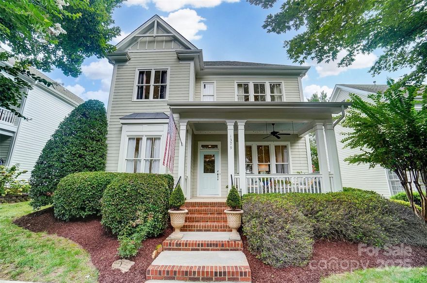 Welcome to 1379 Barnett Woods in the highly sought-after Baxter Village community in Fort Mill, SC! This charming 4-bedroom home with a loft offers over 2,400 sqft of airy, light-filled living. The inviting covered front porch welcomes you inside to gorgeous refinished hardwood floors and a thoughtful floor plan with the primary suite conveniently on the main level. The open living spaces make everyday living and entertaining a breeze. Upstairs, find three spacious bedrooms plus a versatile loft. Enjoy evenings on the lovely back patio surrounded by a private courtyard feel, or relax on the covered front porch across from an expansive community pocket park. With pools, trails, parks, dining, and shopping just steps away, and award-winning Fort Mill schools, this home is the perfect blend of comfort, location, and lifestyle!