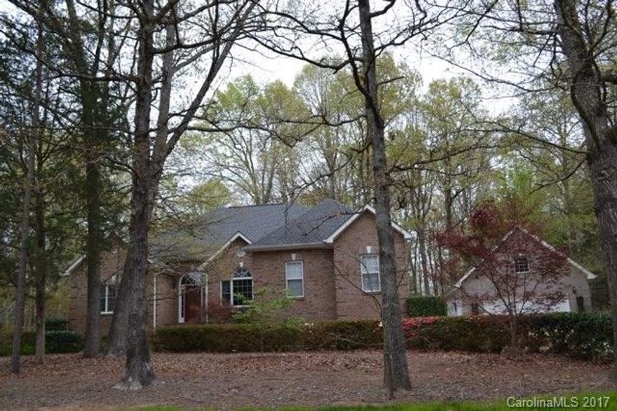 Lovely brick ranch with spit bedroom plan offers 3 bedrooms, 2.5 baths.  Spacious kitchen with corian counter tops, stainless appliances and built-in cabinet in breakfast area. Vaulted great room with fireplace/gas logs and formal dining room.  There is also a formal living room which could be used as an office. There are three bonuses to this home. A detached garage/workshop, storage shed and a greenhouse! Newer windows across the front of the house and roof is only 2 years old. Great location.