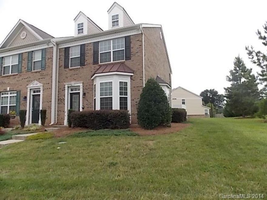 Well-appointed, pristine townhome! Gorgeous hardwood throughout first level, dining room & living room both have elegant bays, a bright granite & stainless steel kitchen w/pantry, lots of cabinets, & large island w/bar extending to a breakfast/morning area. Two bedrooms spacious enough for a sitting area w/vaulted ceilings, large secondary bath, beautiful master w/a walk-in shower,  a jacuzzi soaking tub & ceramic floor. End unit on corner w/enclosed patio! Minutes to Ballantyne, Pineville, I-77