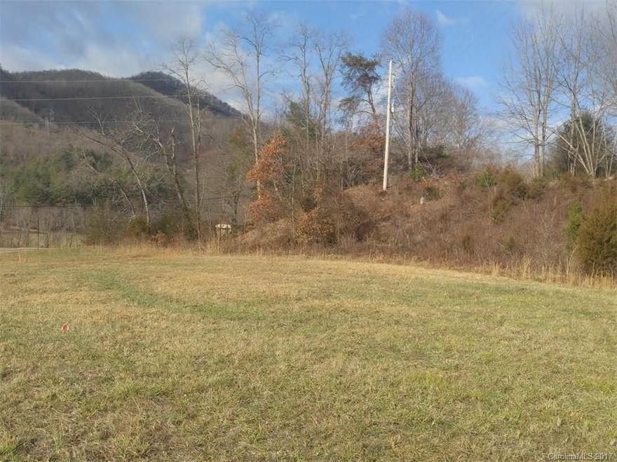 Cleared lot for potential commercial or retail opportunities. heavily traveled section of US 107 between Cullowhee and Cashiers