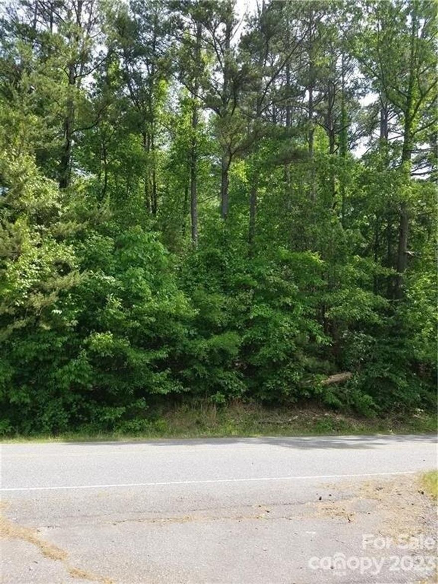 Welcome to an exceptional opportunity to own a prime half-acre residential lot in a highly sought-after location. Build your dream home on this nice community in Troutman off Perth Road North of Mooresville. Lot is wooded with mature trees.