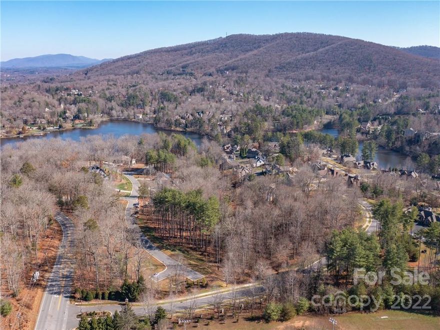 Big news!  Here's a RARE opportunity to build your own home in Biltmore Lake's prestigious gated section of Water's Edge.  All Water’s Edge homesites enjoy easy access to the Scenic Lake Trail that circles the lake and takes you to Clubhouse, Tennis Courts, Boathouse, and Swimming Beach.  This gently sloping lot is PERFECT for a variety of home styles and design.  This community is long sought after by those who want to enjoy a thriving, friendly neighborhood, with all the benefits it offers, plus minutes away from thriving Downtown Asheville, AVL airport and more.  Perfect for lock and go living.  (Note adjacent lot is also for sale - perfect for extended families, etc.)