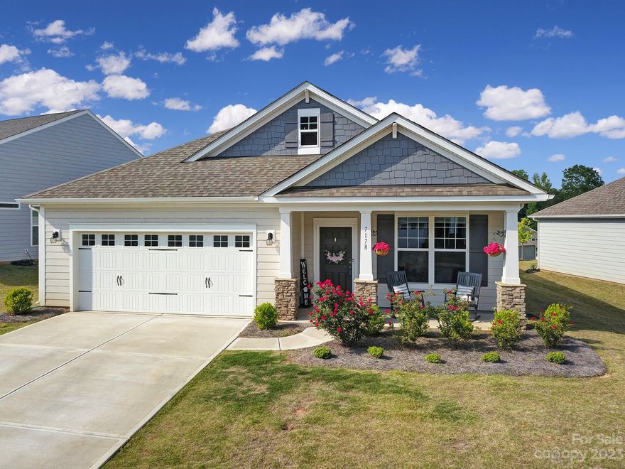 Check out this charming 3/2 ranch home in the desirable Walnut Creek community.  Fall in love with the open floor plan, massive kitchen island, granite countertops, stainless appliances and an abundance of cabinets - perfect for entertaining.  Upgraded appliances, cabinetry and pendant lighting in the kitchen, Luxury vinyl plank flooring throughout all common living areas. Fully sodded yard with full lawn maintenance allows you time to enjoy all the community has to offer – Bocce Ball courts, fire-pit, community garden and Walnut Creek’s award winning clubhouse, fitness center and pools.