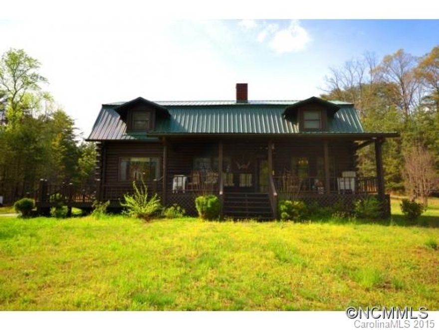 Log cabin with rocking chair front porch and a private setting. Plenty of outdoor yard space for kids, backyard chickens and a garden. The main level has wood floors, a nice sized living area, a full bath and a bedroom. Upstairs are 2 more bedrooms, a full bath and an office or flex room.