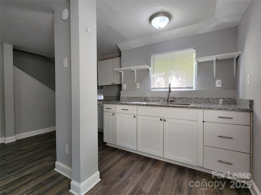 Come view this 3 bedroom, 1 bathroom duplex in downtown Concord close to Gibson Mill. This unit has been updated with newer kitchen cabinets and granite countertops. Durable LVP flooring in the kitchen and bathroom and carpet in the bedrooms. Enjoy the rear deck overlooking a large backyard with plenty of space for outdoor activities. Schools and grocery stores all within a 5 minute drive. Maintenance free living with lawncare included.
*Please note room addition downstairs does not have central heat and air and is considered as is*
No Smoking. No Section 8. Small pets accepted on a case by case basis. Deposit starting at $1195(pending strength of application).  Tour home at your convenience without having to make an appointment. Register with Rently for the lockbox code. All applications must be submitted online on our website. Each adult applicant 18yrs and older living in the home will be required to pay a $50 non-refundable application fee.
