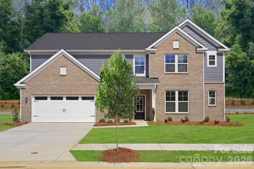Enjoy a sophisticated blend of comfort and contemporary design in this impressive 3,689 sq. ft. EMERSON home featuring 5 bedrooms and 4.5 baths. The open-concept layout is accented by refined finishes and a welcoming ambiance throughout. The gourmet kitchen is a true focal point, offering quartz countertops, a designer cabinet hood, a large island, and a walk-in pantry—ideal for both everyday living and entertaining guests. A main-level pocket office provides a convenient and private workspace, while the family room with a cozy fireplace sets the stage for memorable gatherings. Upstairs, the primary suite offers a tray ceiling, spacious walk-in closet, and spa-inspired bath. Generous secondary bedrooms and a versatile loft space allow for a media room, play area, or home gym. Unwind on the screened patio and take advantage of energy-efficient features designed for year-round comfort. Step into elevated living—schedule your private tour of the EMERSON today!