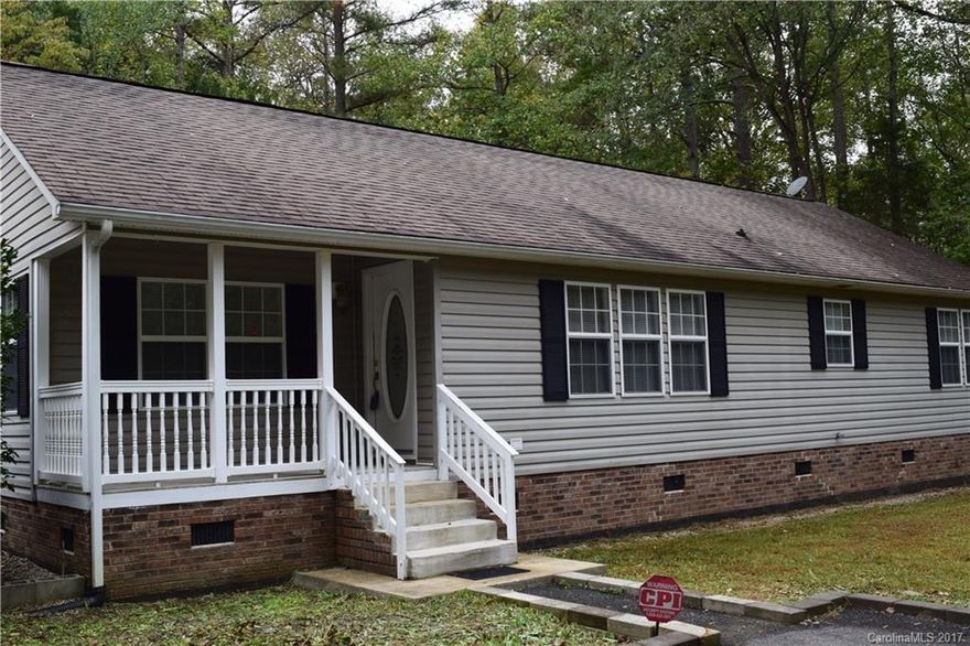 Country Living Must See in a Great School District!!! 3Bed 2Bath Modular located on an almost 2 acre country lot in Lewisville School District. New carpet, new cabinets, spacious dining with a breakfast and separate dining area. Country living yet located within 20 minutes of Lancaster shopping, and 15 minutes from I-77. Small drive to nearby Fishing Creek and Lake Wateree. Also includes carport and storage building.