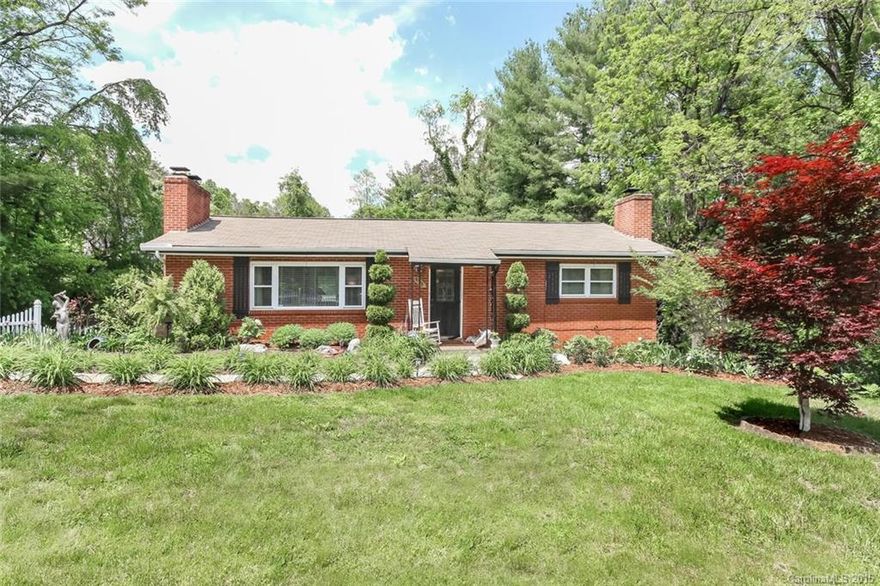 Solid well maintained brick ranch just minutes to Downtown, Mission or VA.  Private In-law suite in basement with separate entrance.  New all-weather sun porch. 500+ sq ft wrap-around deck steps out to quiet level backyard. Single garage/workshop in basement.  Fully fenced .50 acres on 3 lots. Possibly sub-dividable. Buyer to confirm with city.
