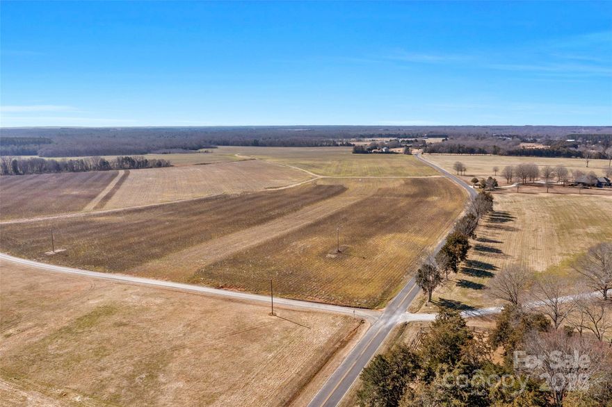 6 Acres in Rock Hill for sale! If you are looking for the country lifestyle yet still close to modern amenities, then look no further! This expansive 6 Acres offers the country lifestyle with long range farm views and is about 15 minutes outside Dave Lyle BLVD, 20 Min outside Fort Mill, 35 min Outside Charlotte. This land is flat and ready to build on for your custom home. With being a corner lot, there is road frontage on two sides with over 1000' of road frontage, there is more than enough space for you to design your entrance for access and design your build. 

With this location, size of lot, and Agriculture zoning, there is more than enough space for you to build your custom home and large garage in a peaceful setting, garden, recreate, and live the county lifestyle! No manufactured homes allowed in AGC-I zoning.