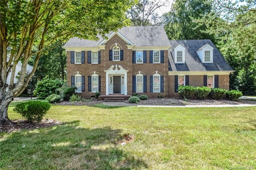 Beautiful Wynfield all brick home! 4/5BR, 5 Bedroom is very large bonus room with closet. Dual stairway one off rear of bonus and one in the foyer. Wood burning fireplace. All bathrooms have been completely updated with new cabinets,countertops,and toilets. All carpet throughout the home is brand new, with brand new blinds throughout the home and ceiling fans. The deck has been completely redone and refinished. Wood flooring has been refinished and new paint throughout the home. Beautiful home!!