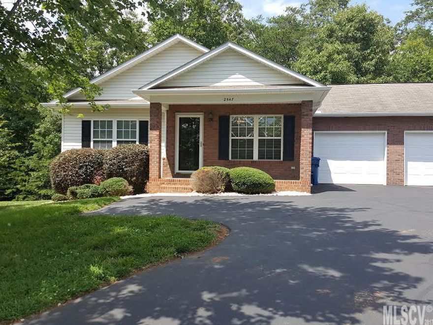 City Close, County Quiet!  Needlestone community offers a quiet and friendly atmosphere, tucked conveniently away from all of the hustle and bustle. Brick & vinyl 2 bedroom, 2 full bath, one level home with an attached single garage offers an open plan with built in shelving, gas log fireplace, spacious kitchen including all of the appliances, two large bedrooms with private baths, slick ceilings, a secluded deck with loads of privacy in the rear.  There is plenty of storage in the attached garage with additional storage room. Well managed HOA with low fees and lovingly cared for common areas.  Take a walk around circle and stop to chat with your neighbors or sit on your front porch and simply relax!